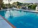 Refreshing pool with surrounding patio and waterfront location at 4921 W San Rafael St, Tampa, FL 33629