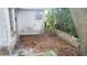 Small patio area with leaf debris at 4937 State Road 54, New Port Richey, FL 34652