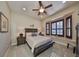 Spacious bedroom with window seat and ceiling fan at 5407 Tybee Island Dr, Apollo Beach, FL 33572