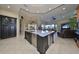 Large kitchen island with seating and high-end stainless steel appliances at 5407 Tybee Island Dr, Apollo Beach, FL 33572