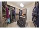 Huge walk-in closet with ample shelving and drawers at 5407 Tybee Island Dr, Apollo Beach, FL 33572