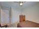 Bedroom with double bed, dresser, and double door closet at 7064 Towne Lake Rd, Riverview, FL 33578