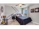Stylish bedroom with a built-in workspace and window seat at 10831 Hidden Banks Gln, Parrish, FL 34219