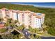 Luxury condo building, waterfront location, with tropical landscaping at 12077 Gandy N Blvd # 374, St Petersburg, FL 33702
