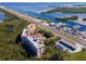Aerial photo of condo building near highway, marina, and waterfront at 12077 Gandy N Blvd # 374, St Petersburg, FL 33702
