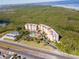 Aerial view showing condo complex near highway and water at 12077 Gandy N Blvd # 374, St Petersburg, FL 33702