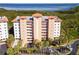Luxury condo building, waterfront location, with tropical landscaping at 12077 Gandy N Blvd # 374, St Petersburg, FL 33702