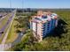 Luxury condo building, waterfront location, with tropical landscaping at 12077 Gandy N Blvd # 374, St Petersburg, FL 33702