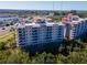 Luxury condo building, waterfront location, with tropical landscaping at 12077 Gandy N Blvd # 374, St Petersburg, FL 33702