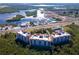 Aerial view showing two condo buildings near the waterfront at 12077 Gandy N Blvd # 374, St Petersburg, FL 33702