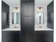 Modern bathroom with double vanity and marble tile at 12077 Gandy N Blvd # 374, St Petersburg, FL 33702