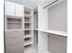 Large walk-in closet with shelving and hanging rods at 12077 Gandy N Blvd # 374, St Petersburg, FL 33702