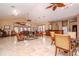 Community room with seating, tables, and a kitchenette at 12077 Gandy N Blvd # 374, St Petersburg, FL 33702