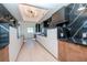 Modern kitchen with dark marble backsplash and wood cabinets at 12077 Gandy N Blvd # 374, St Petersburg, FL 33702