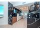 Modern kitchen with a long island and dark marble accents at 12077 Gandy N Blvd # 374, St Petersburg, FL 33702