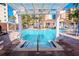 Pool area with pergola and building views at 12077 Gandy N Blvd # 374, St Petersburg, FL 33702