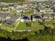 Aerial view of homes with solar panels and pools at 12609 Pensacola Ct, Riverview, FL 33579