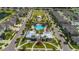 Community pool, playground, and clubhouse with surrounding homes at 12609 Pensacola Ct, Riverview, FL 33579