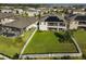 Aerial view showcasing a home's backyard and pool at 12609 Pensacola Ct, Riverview, FL 33579