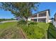 Expansive backyard with mature trees and lush landscaping at 12609 Pensacola Ct, Riverview, FL 33579