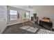 Well-lit bedroom with built-in shelving and a view at 12609 Pensacola Ct, Riverview, FL 33579