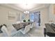 Spacious dining room with a large table and stylish decor at 12609 Pensacola Ct, Riverview, FL 33579