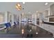 Modern kitchen with stainless steel appliances and large island at 12609 Pensacola Ct, Riverview, FL 33579
