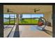 Spacious screened porch with view of the backyard at 12609 Pensacola Ct, Riverview, FL 33579