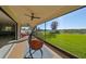 Relaxing screened porch overlooking grassy backyard at 12609 Pensacola Ct, Riverview, FL 33579