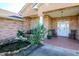 Front porch with rocking chairs, a swing, and a small pond at 1827 Joe Mcintosh Rd, Plant City, FL 33565