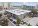 Aerial view of modern building in urban setting with city skyline and street view at 217 N 12Th St # 112, Tampa, FL 33602