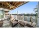 Waterfront balcony with seating and ceiling fan at 219 18Th Ave, Indian Rocks Beach, FL 33785