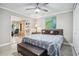 Bedroom with queen bed and built-in shelving at 2260 E Vina Del Mar Blvd, St Pete Beach, FL 33706