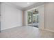 Bright dining area with sliding glass doors leading to patio at 33153 Shadow Branch Ln, Wesley Chapel, FL 33545