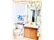 Bright bathroom with sink and toilet at 6960 20Th N Ave # 501, St Petersburg, FL 33710