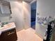 Clean bathroom with single sink vanity and shower/tub combo at 6960 20Th N Ave # 501, St Petersburg, FL 33710