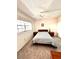 Well lit bedroom with double bed and wood furniture at 6960 20Th N Ave # 501, St Petersburg, FL 33710