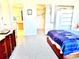 Bedroom with ensuite bathroom and walk-in closet at 6960 20Th N Ave # 501, St Petersburg, FL 33710