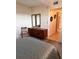 Bedroom with dresser, chair and access to hallway at 6960 20Th N Ave # 501, St Petersburg, FL 33710