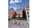 Building entrance with arched entryway and seating area at 6960 20Th N Ave # 501, St Petersburg, FL 33710