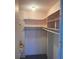 Spacious walk-in closet with ample shelving and hanging space at 6960 20Th N Ave # 501, St Petersburg, FL 33710