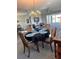 Dining room with round table and chandelier at 6960 20Th N Ave # 501, St Petersburg, FL 33710