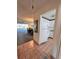 Entryway with view into kitchen and living areas at 6960 20Th N Ave # 501, St Petersburg, FL 33710