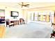 Bright living room with ample space, large windows, and city views at 6960 20Th N Ave # 501, St Petersburg, FL 33710