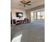 Spacious living room featuring a large TV and comfortable seating at 6960 20Th N Ave # 501, St Petersburg, FL 33710