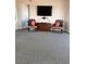 Living room with comfy seating and a large flat screen TV at 6960 20Th N Ave # 501, St Petersburg, FL 33710