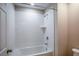 Simple bathroom with shower/tub combo at 7691 Peace Lily Ave, Wesley Chapel, FL 33545