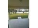 Fenced-in backyard with grassy lawn and patio at 8216 Carriage Pointe Dr, Gibsonton, FL 33534