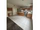 Kitchen features wood cabinets and a large island at 8216 Carriage Pointe Dr, Gibsonton, FL 33534