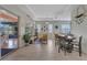 Casual dining area with table and chairs, and access to the sunroom and kitchen at 824 Regal Manor Way, Sun City Center, FL 33573